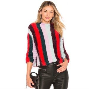 Striped mock neck sweater.